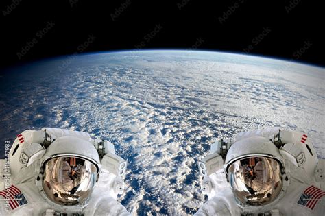 High Resolution Planet Earth Two Astronauts Spaceman Helmet Suit