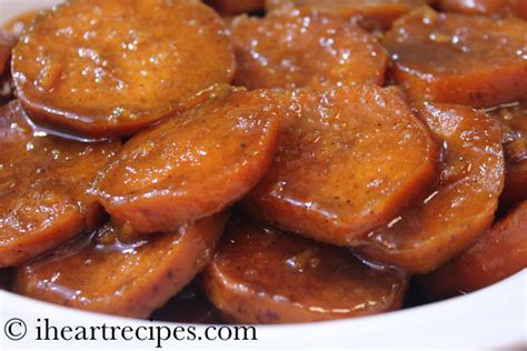 Use a mixing spoon to toss the sweet potato in the sugar mixture to coat. Baked Candied Yams - Soul Food Style! | I Heart Recipes