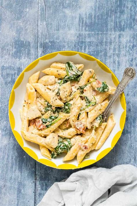 Pour in chicken broth, scraping off browned bits from the bottom with a wooden spoon. Instant Pot Creamy Tuscan Chicken Pasta - Recipes From A ...