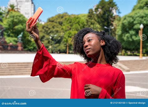 A Black Woman Taking A Selfie In The City Stock Photo Image Of