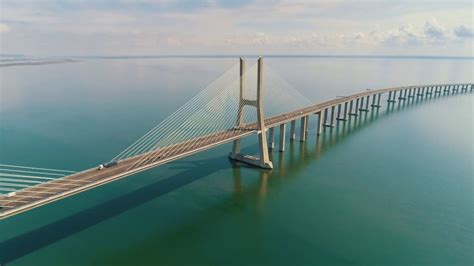 It is the longest bridge in the european union, and the second longest in all of europe after the crimean bridge with a total length of 12.3 kilometres. Aerial View 4K - Ponte Vasco da Gama vista do ar - Bridge - Lisbon - Portugal - YouTube