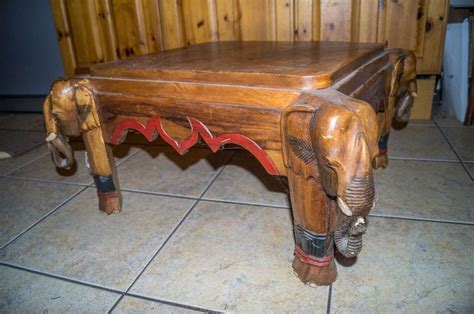 This square surface may enable you to support pieces that you want it to. Coffee table Elephant carved legs Square | Coffee table ...