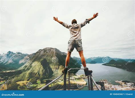 Man Raised Hands Balancing At The Edge Cliff Stock Image Image Of