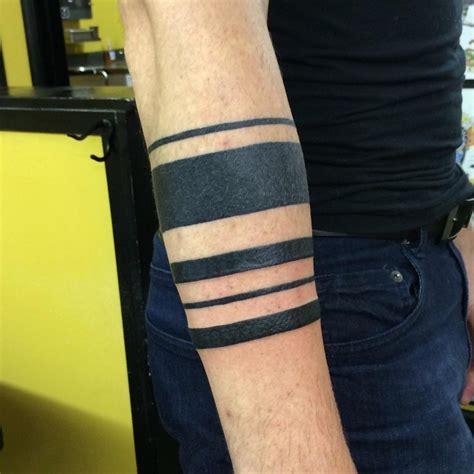 Simple Black Ink Arm Tattoo Of Different Straight Lines Tattooimagesbiz