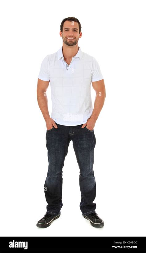 Attractive Young Man Standing In Front Of Plain White Background Stock