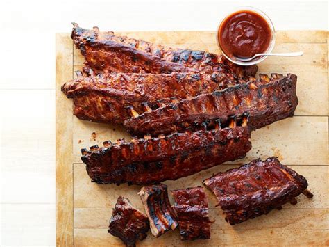 Pork spareribs are rubbed with a sweet and spicy dry rub, slowly smoked over red wine and fruits, then finished on the grill with a sticky barbeque sauce. Cola Barbecue Ribs Recipe | Food Network Kitchen | Food ...