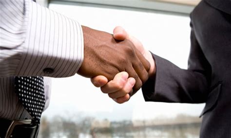 Two people shaking hands gif. The secret to building trust | Money | The Guardian