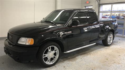 Extended cab pickup with a leer bed hard topper. 2000 Ford F150 Harley-Davidson Edition Pickup | F129 ...