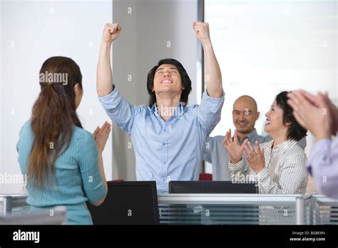 Office Workers Celebrate A Success Stock Photo Alamy