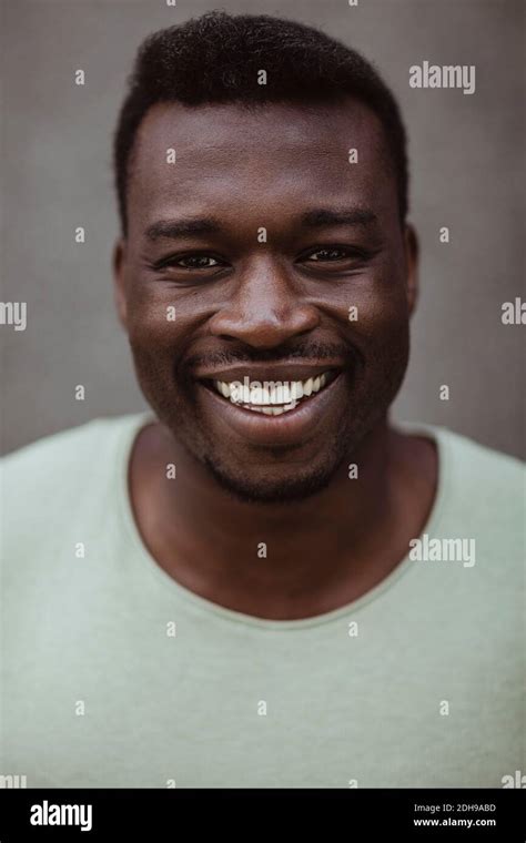 Close Up Portrait Of Happy Man Standing Outdoors Stock Photo Alamy