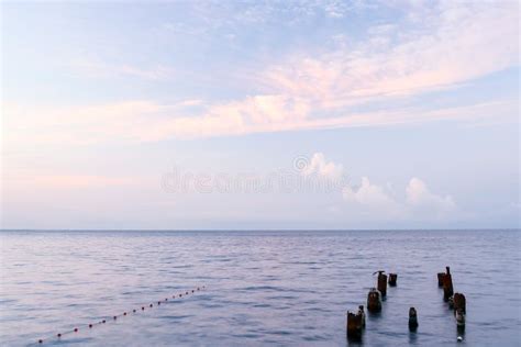 Seascape With Beautiful White Pink Clouds At The Dawn Stock Image