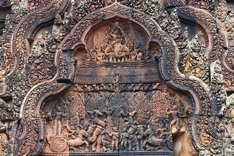 Ancient Temple Carvings In Cambodia Photograph By Artur Bogacki