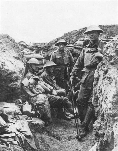 A Group Of Anzac Soldiers Stand In The Trenches During The Battle Of