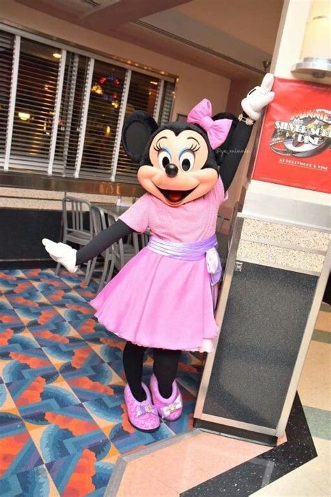 Minnie Striking A Sweet Pose While Heading To Her Mickey Mouse