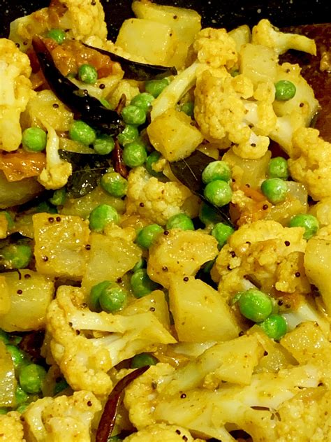 Gujarati Cauliflower Potato And Peas Cook With Roshni