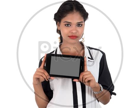 Image Of Young Indian Girl Showing Blank Smart Phone Screen And