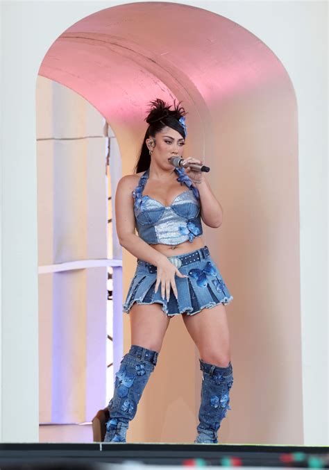 Kali Uchis Performs At Coachella 2023 In D G Butterfly Denim Boots