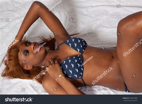 Lovely African American Woman Laying Down Stock Photo