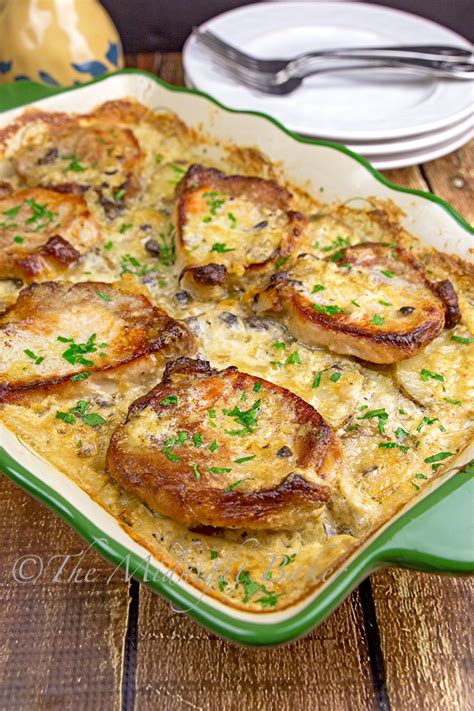 Pork chops are browned, then baked in a creamy mushroom sauce with potatoes, onion and cheese. Pork Chops & Scalloped Potatoes Casserole - The Midnight Baker