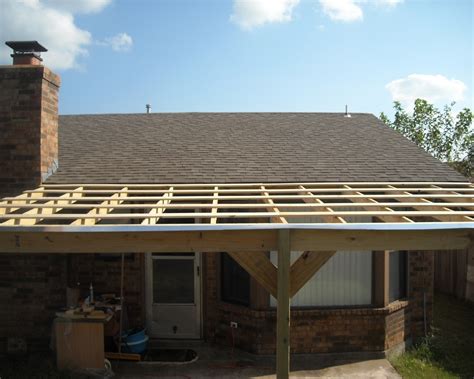 A flat roof for small private houses with a small area of the roofing is the task that can easily be done with your own hands. How to Build a Patio Cover with a Corrugated Metal Roof ...