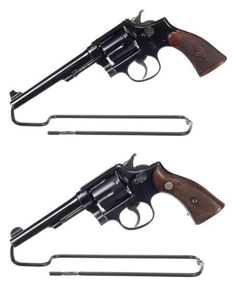 Two Smith And Wesson 38 Military And Police Double Action Revolvers Rock