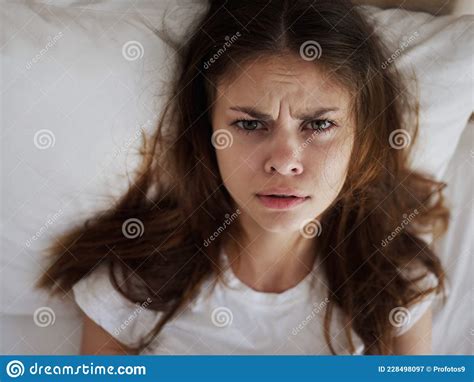 Disappointed Woman Lying In Bed Dissatisfaction Close Up Stock Image