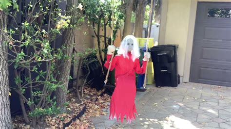Spirit Halloween Creepy Crimson Girl On A Swing Animatronic Demo