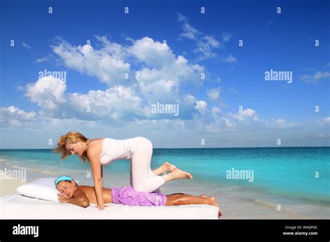 Caribbean Beach Therapy Shiatsu Massage On Knees Women In Paradise