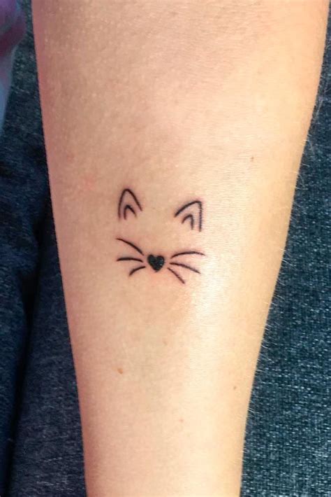 A Cat Tattoos Guide To Help You Choose Cat Tattoo Simple Minimalist