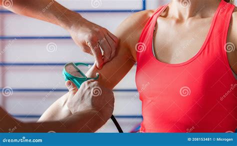 Body Fat Skinfold Test For Adults Using Caliper On An Upper Arm Over