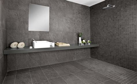 I see 5 different tile treatments in this bath. Can You Put Floor Tiles On The Wall? | Tileflair