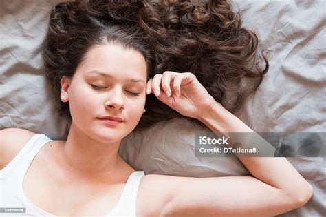 Beautiful Girl Sleeps In The Bed Stock Photo Download Image Now