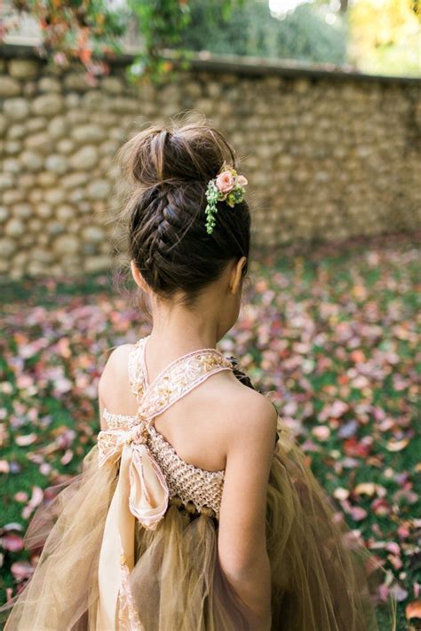 Spray your hair with hairspray to set the style. Forest-Inspired Indoor Wedding | Flower girl hairstyles ...