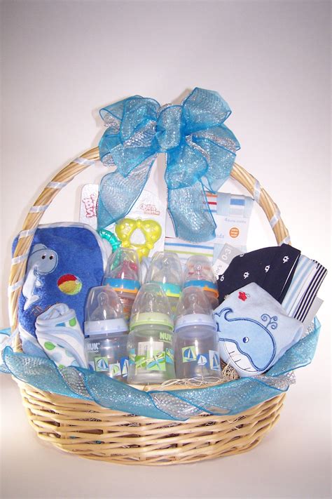 Buying baby gifts that make sounds or play music is another excellent idea for this age range. Baby Shower... it's a Boy! Gift Basket | Baby shower gifts ...