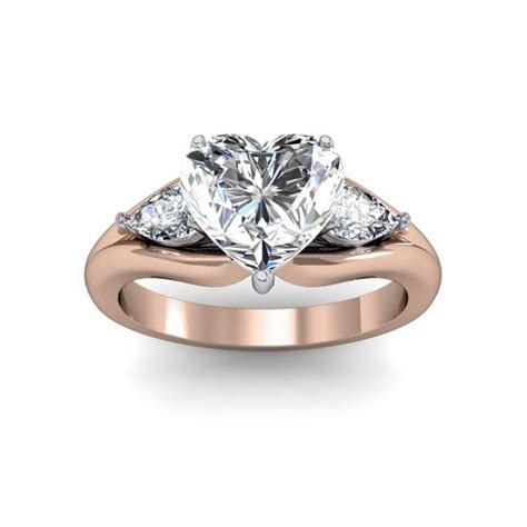 Two hearts rose gold engagement ring the two hearts rose gold engagement ring symbolises the undying love, passion and loyalty of two people who are destined to spend the rest of their lives together. Rose Gold Heart Shape Engagement Rings | Diamond Mansion