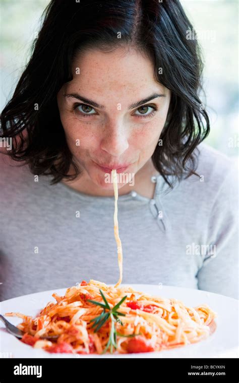 Woman Eating Spaghetti Stock Photo Alamy
