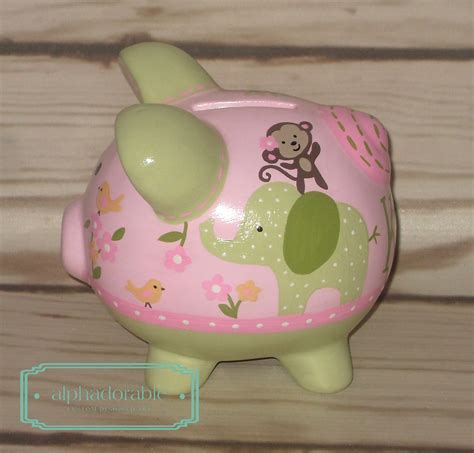 Comes in many designs that your kid is sure to love. Alphadorable: Custom Hand painted piggy banks to match ...