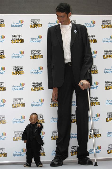 Worlds Tallest Man Stops Growing Photos