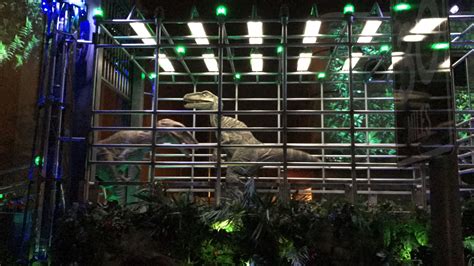 Jurassic Park Raptors In A Cage Night Parade Usj Jurassic Park Raptor Jurassic Park