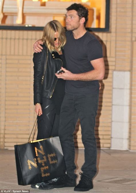 Lara Bingle And Sam Worthington Cant Take Their Hands Off Each Other