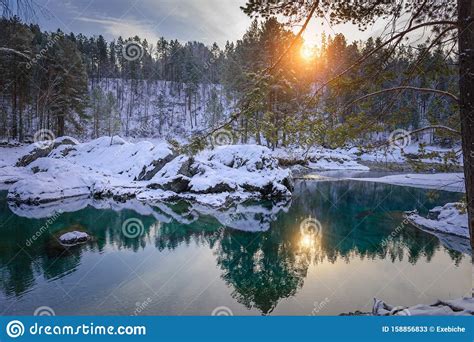 Winter Landscape Small Ice Free Lake In The Mountains Among Snow