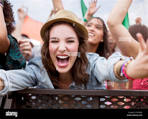 Close Up Of Cheering Woman At Music Festival Stock Photo Alamy