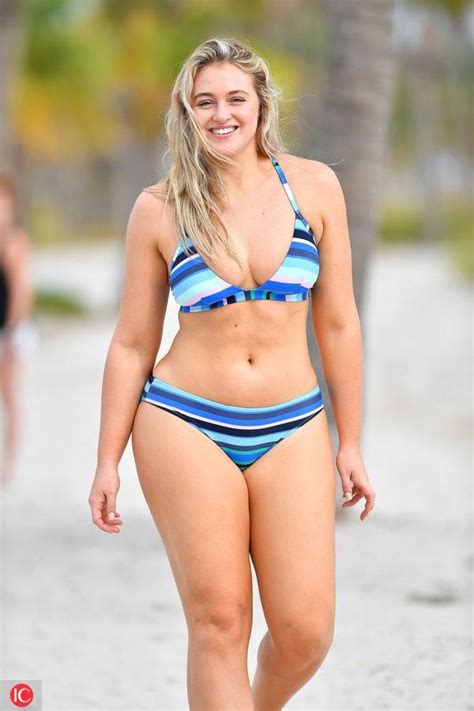 British Model Iskra Lawrence Wears A Blue Swimsuit During A Photo Shoot