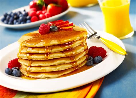 Food And Beverage Photographer Pancakes With Berries And Orange Juice