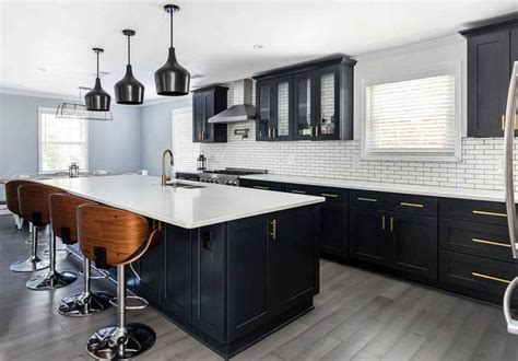 Modern single line kitchen with black modern cabinets and island contrasted nicely with light gray countertops and chrome bar stools. Beautiful Black Kitchen Cabinets (Design Ideas ...