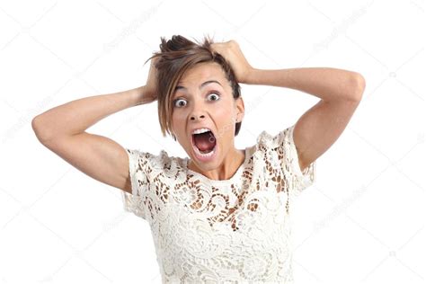 Front View Of A Scared Woman Screaming With Hands On Head Stock Photo