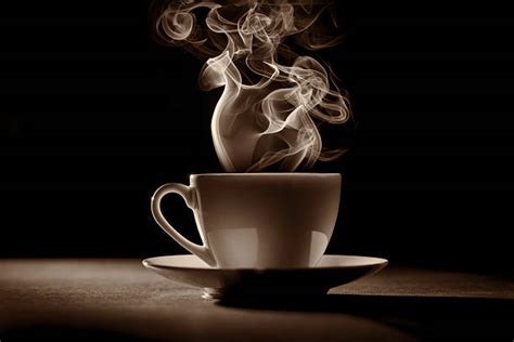 Steaming Cup Of Coffee Stock Photos Pictures And Royalty Free Images
