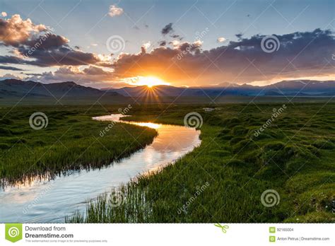 Beautiful Sunset Over The Mountain River In Summer Stock