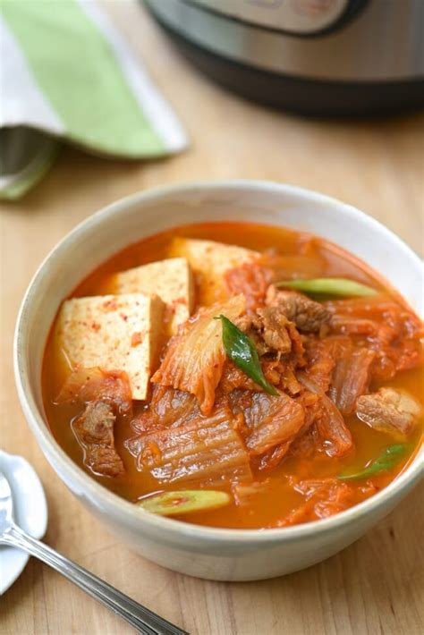 When the green onions and onions are fried, fry with spam and cabbage. Instant Pot Kimchi Jjigae (Stew) | Rising Grill