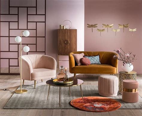 A Living Room With Pink Walls And Furniture In The Corner Including